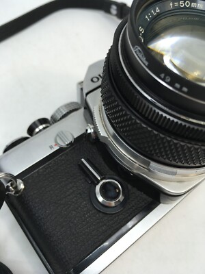 Olympus OM-1 SLR Film Camera w/ Zuiko 50mm f1.4 Extra Lenses And