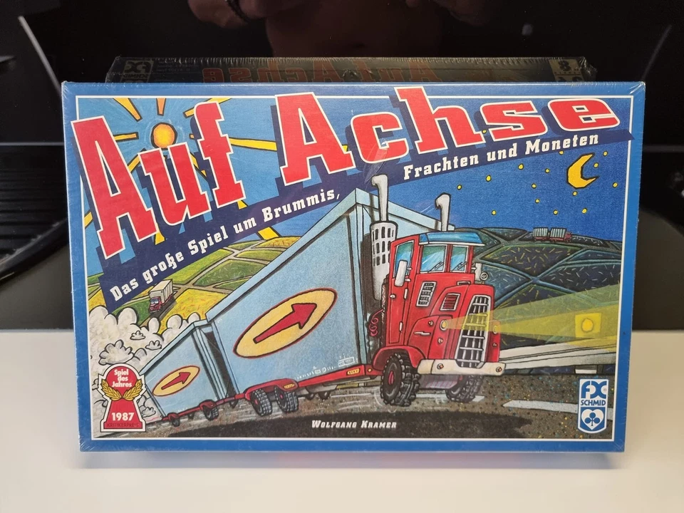 Auf Achse. Das Spiel um Brummis, Frachten und Moneten von 1986. Neu in Folie. - Bild 1 von 1