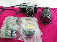 Canon AE-1 35mm SLR Film Camera Kit With 2 lenses and extras  