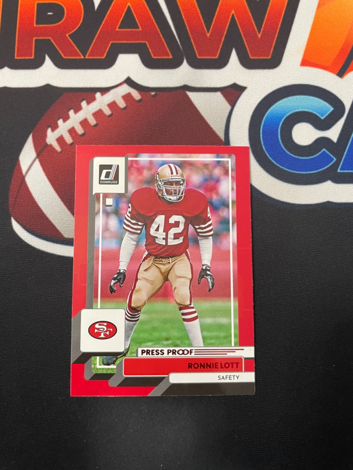 Ronnie Lott #29 Football Cards 2022 Panini Donruss trading card — raw and PSA graded price guide