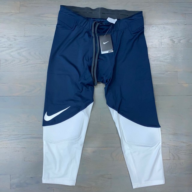 navy blue nike football pants
