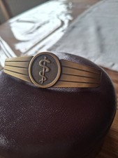 Altes Sanitäter Abzeichen - Äskulapstab - Hersteller Assmann (A) - Militaria