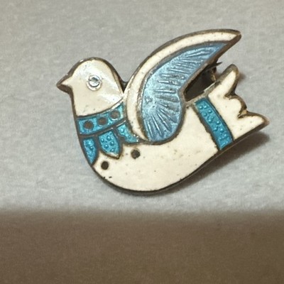 vintage Jeronimo Fuentes silver peace dove brooch featuring white & blue enamel