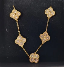 Golden necklace with well cut fine crystals,18"-new in box. NIC & SYD is maker!