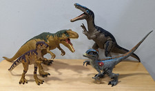 Lot of 4 - Jurassic Park - Jurassic World Dinosaur Figures Raptor T-Rex Baryonyx
