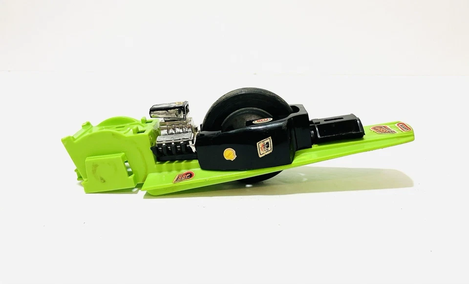 Kenner SSP Siamese Slingshot Green 1970 vintage con cable original dañado Foto 3 de 4