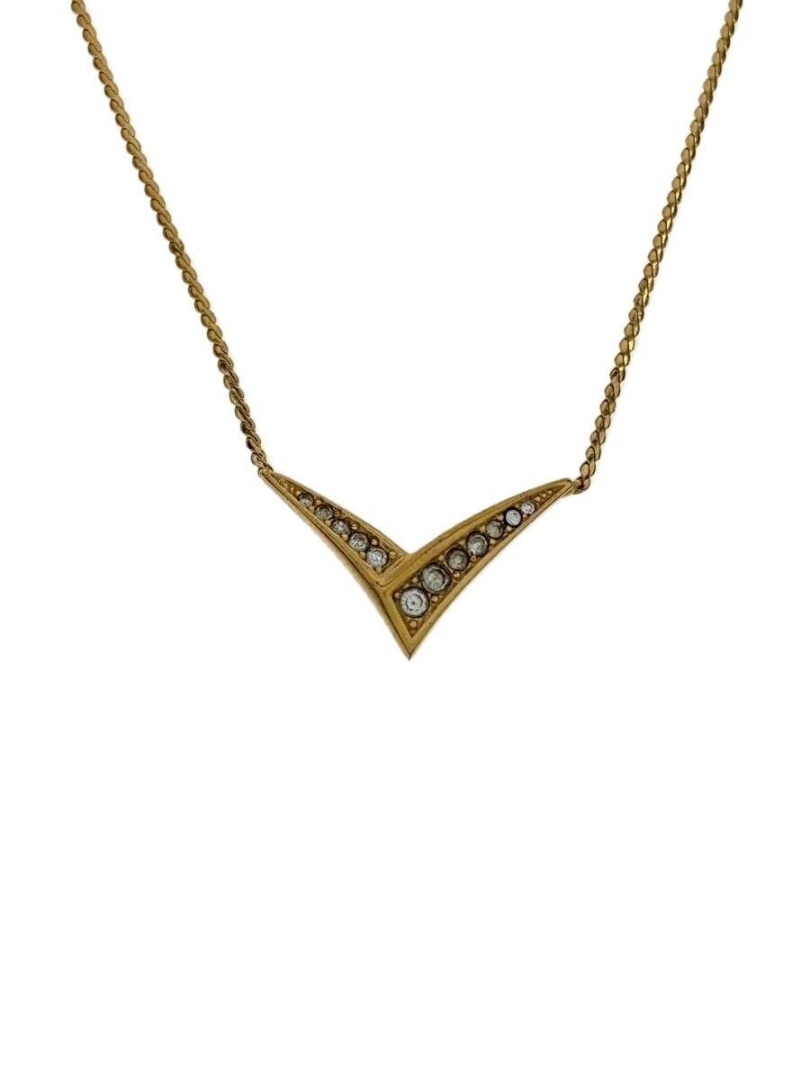 Collana Christian Dior motivo V pietra chiara usata da donna