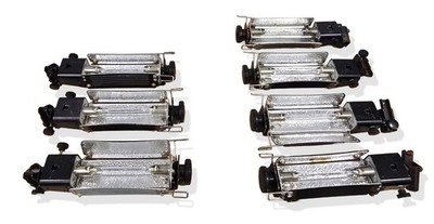 (7) Lowel Tota Studio Lighting, (7) power cords, (2) Umbrellas & (2) Gel Holders