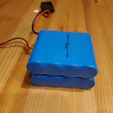 2 Altec Lansing Rechargeable 4-Cell Li-ion battery packs  (8 Cells Total)