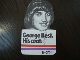 GEORGE BEST SIGNED ORIGINAL ON ADVERT FOR HIS COAT MAN UTD N IRELAND