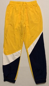 nike big swoosh woven pants