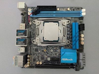 ASRock X99E-ITX/ac. Mini LGA 2011. Dual Gb ethernet, 6x sata. cosmetic issues