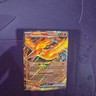 Team Rocket's Moltres ex 031/182 Double Rare Full Art Holo 220 HP Pokémon Card