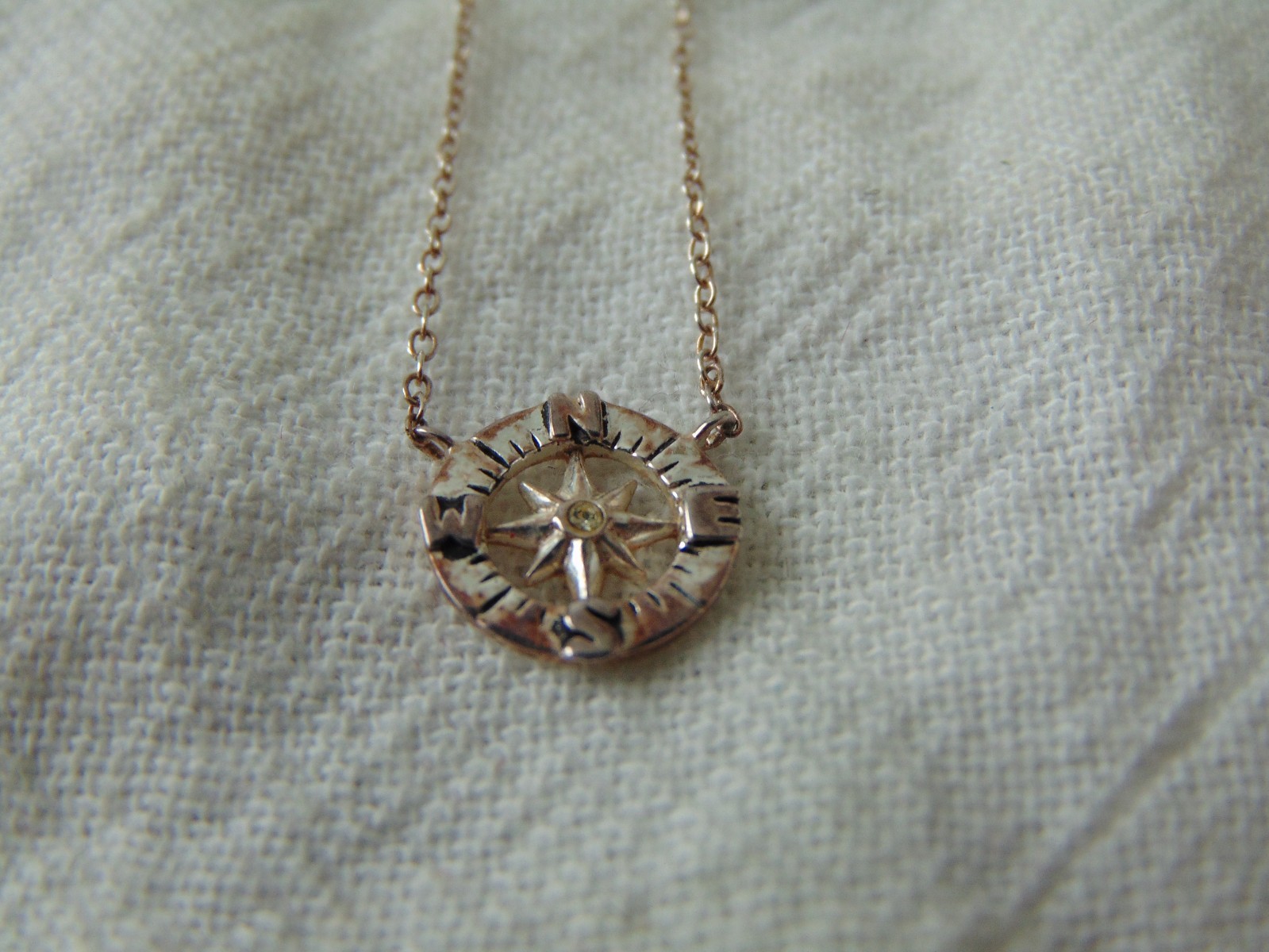 TH sterling silver compass pendant necklace w/crystal chip