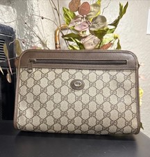Gucci Accessory Collection Small GG Monogram Clutch with Front Zip Pocket