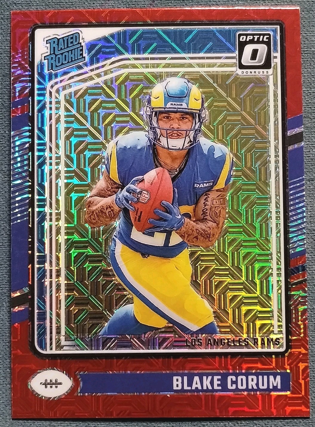 2024 Panini Donruss Optic - Rated Rookie Blake Corum #208 Red Mojo Prizm (RC)