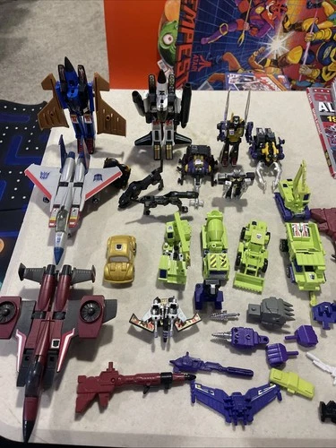 Lot of 21 G1 Transformers plus weapons and accessories Hasbro Takara