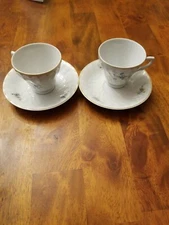 Designpac Tea Cups And Saucers.  Blue Floral Footed Cups And Saucers