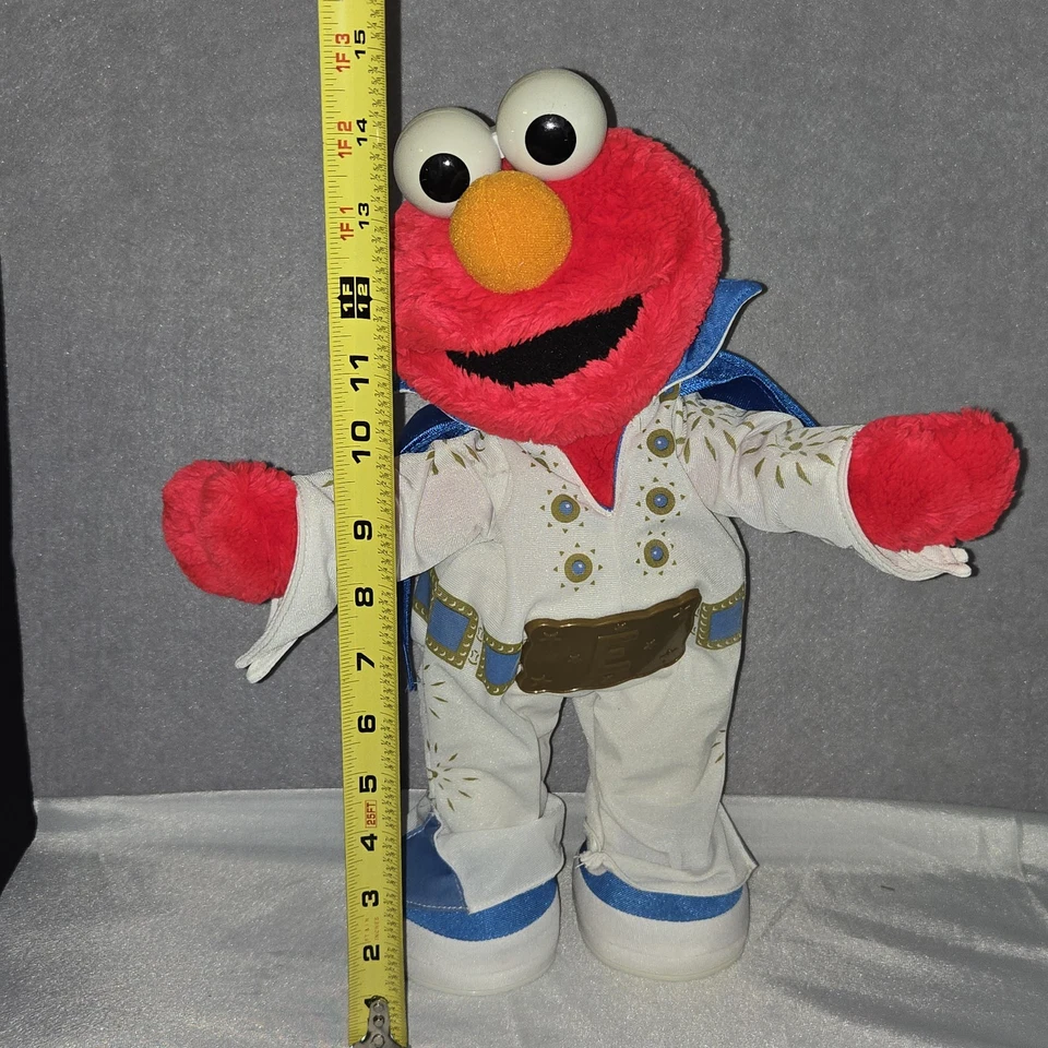 Peluche Elvis La Leyenda Elmo Plaza Sésamo Cantando Bailando 15" Exclusivo de Avon Foto 2 de 4