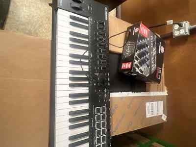 Oxygen Pro 49   49 Key USB MIDI Keyboard Controller With Beat Pads, MIDI assist.