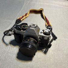 Canon AE-1 Silver Vintage 35mm SLR Film Camera w/ Lens and Strap
