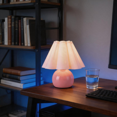 Pink table lamp with beige shade perfect for cozy bedroom nightstands