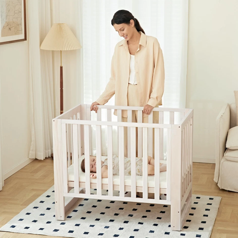 EvoNest Baby Crib, 6 in 1 Convertible Mini Crib with Wheels, 100% New Zealand... - Image 3 of 4