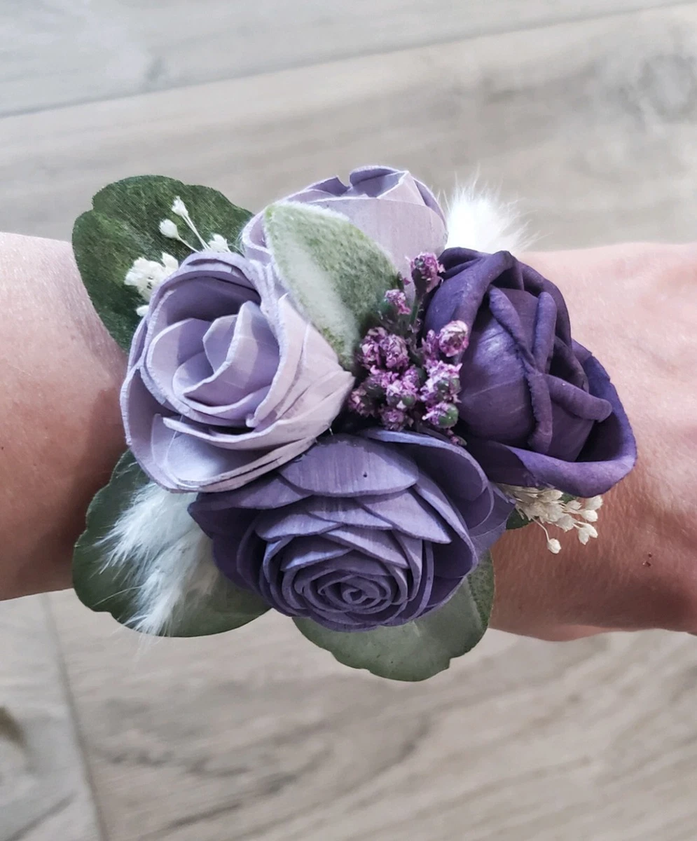 Purple wrist 2024 corsage for prom