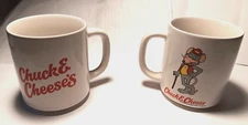 LOT OF 2 1986 CHUCK E CHEESE COFFEE CUP SHOWBIZ PIZZA TIME INC
