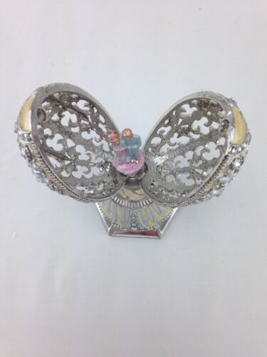 Music box smaltato su metallo gioiello a forma di uovo - Foto 7 di 7