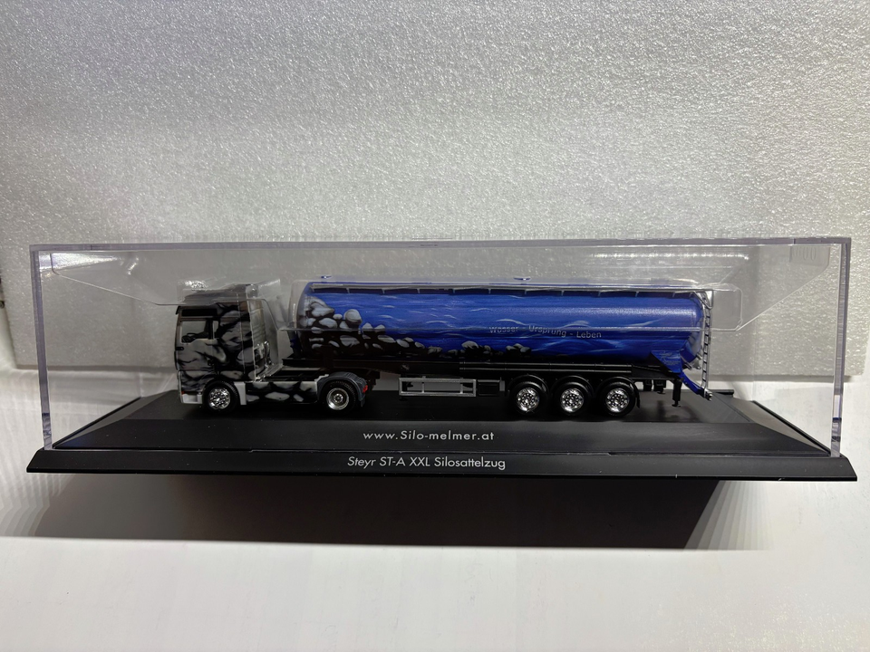 Herpa Steyr STA XXL Silo-Sattelzug Melmer / Raich (A) 121026