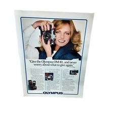 1981 Olympus OM10 Camera with Cheryl Tiegs Original Vintage print ad 80s