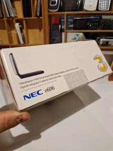 NEC E606 Scellé