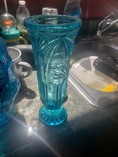 vintage aqua blue pressed glass vase with ribbed and starburst design