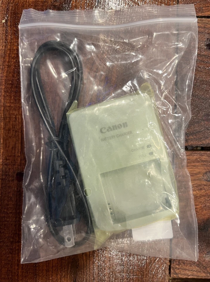Cargador de batería Canon CB-2LYE con cable de alimentación nuevo OEM genuino Foto 2 de 4