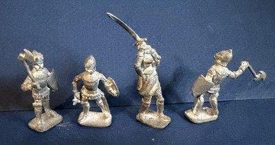 MARCUS HINTON 4 Vintage Unpainted Toy Soldiers