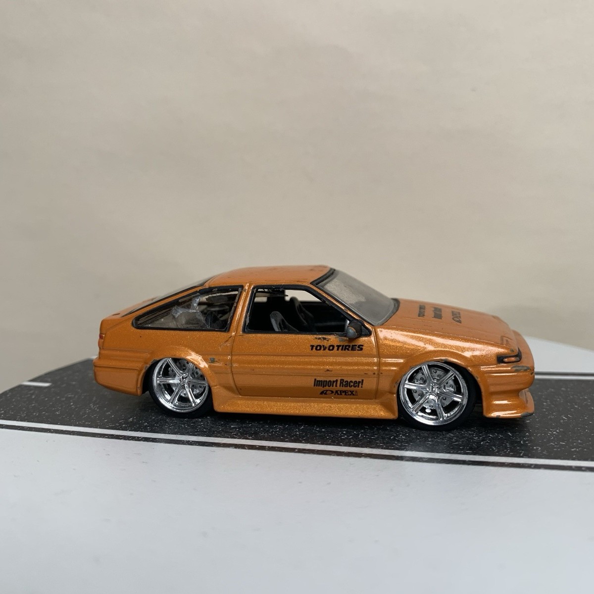 ミニカー Import Racer 1/24 Toyota Trueno AE86 Jada Toys Import Racer Toyota Corolla AE86 Trueno Hatch Orange 1