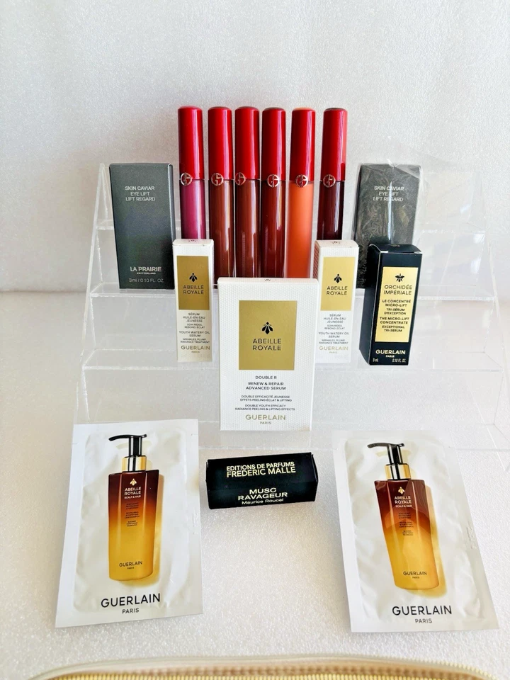 15 MUESTRAS DE COSMÉTICOS LA PRAIRIE GUERLAIN ARMANI DELUXE más BOLSO CLE DE PEAU Foto 3 de 4