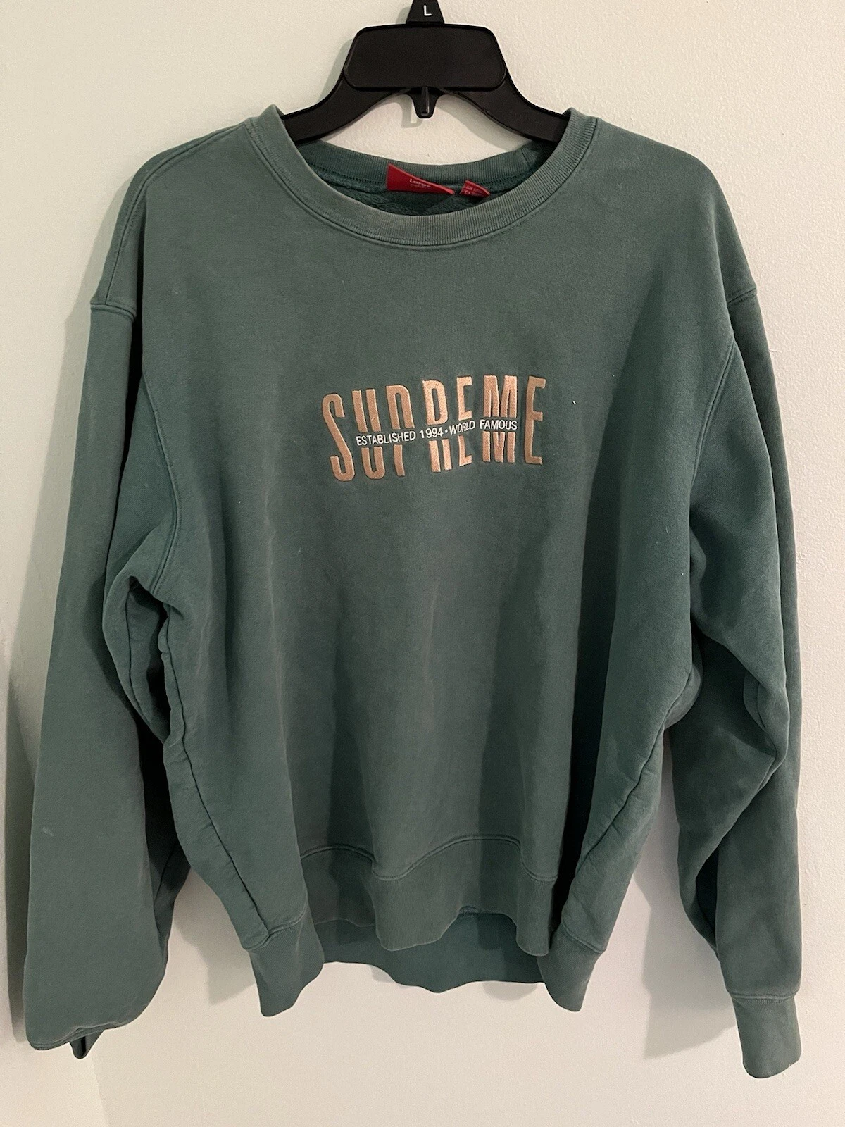 Pull sarcelle Supreme FW18 World Famous
