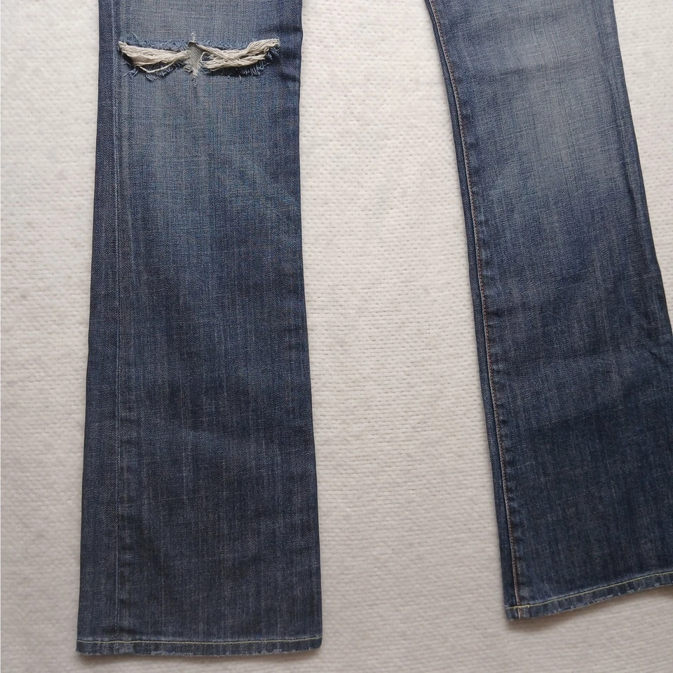 Pantalones de mezclilla para mujer People's Liberation Tanya Bootcut tiro bajo lavado medio Foto 3 de 4