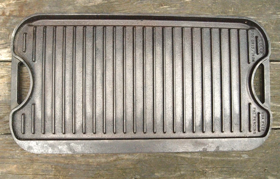 CHAPA REVERSÍVEL DE FERRO FUNDIDO LODGE (temperada) FEITA NOS AMERICANOS 20x10,5" EX COND. - Imagem 4 de 4