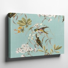 Vintage style canvas wall art with birds and floral branches on teal background
