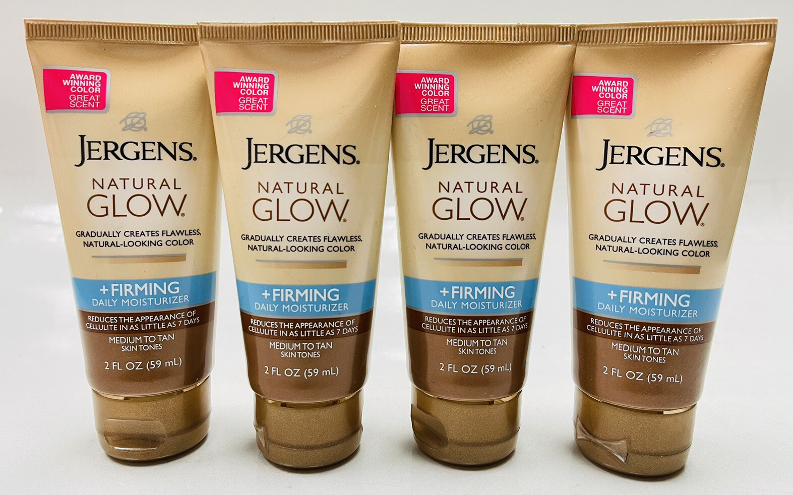 4 jergens natual glow+firming mediumtan 2oz ea TRAVEL SIZE eBay