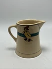 Roseville Pottery Juvenil Creamware Duck with Red Hat and Boots Creamer