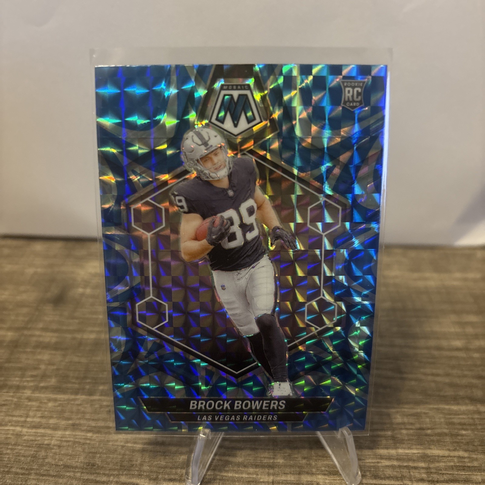 2024 Panini Mosaic - Rookies Brock Bowers #313 Reactive Blue Mosaic Prizm (RC)