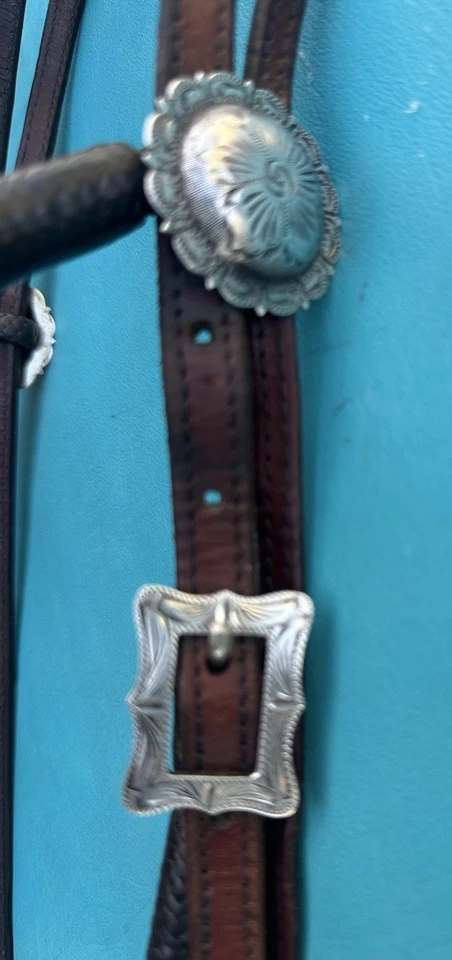 Cabecero vintage de cuero flamenco y canguro de plata de ley Foto 2 de 4