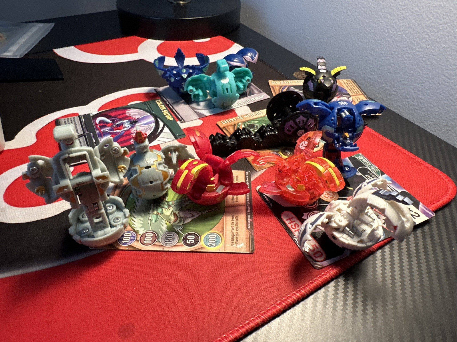Lot of 12 Bakugan, 9 Cards and a Carrying Case
