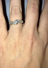 9ct White Gold Diamond Solitaire Infinity Twist Ring Size K H. Samuel