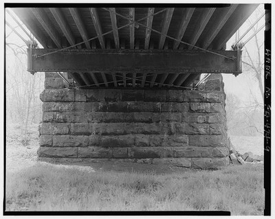 9. VIEW OF SOUTHERN ROCKFACED DRESSED AND MORTARED STONE ABUTMENT, SHOWING
