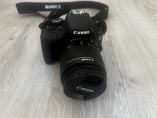Canon EOS 100D 18.0 MP Digital SLR Camera - Charging Cable and Bag Included